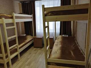 Гостиница Север Плюс Ноябрьск Односпальная кровать в общем номере с 6 кроватями-1